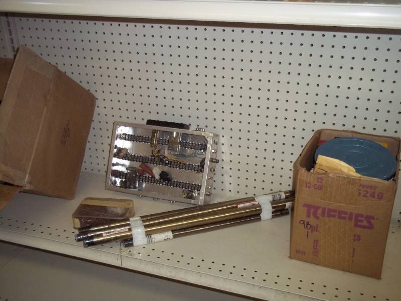 lot 299 image: Transistors, circuit box, magnetic recording tape, switches, ceiling fan down rods