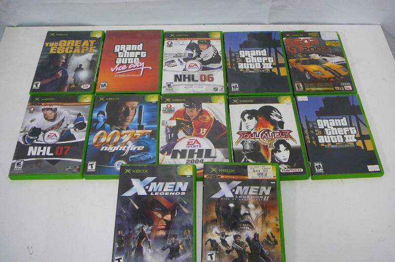 lot 42 image: X box and games 12 count