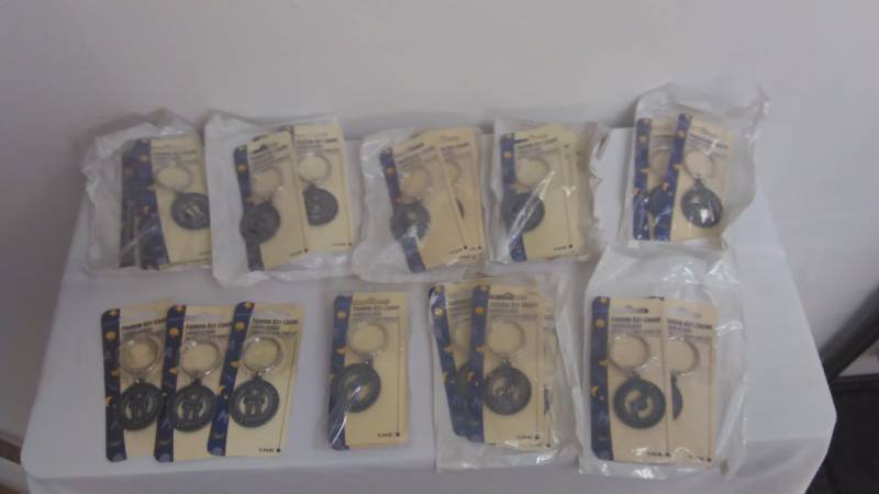 lot 78 image: Zodiac Key Rings (9 pgs.) See Pictures
