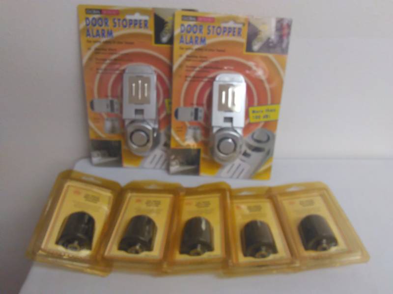 lot 211 image: Door Stopper Alarms (2), Drill Chucks (5)