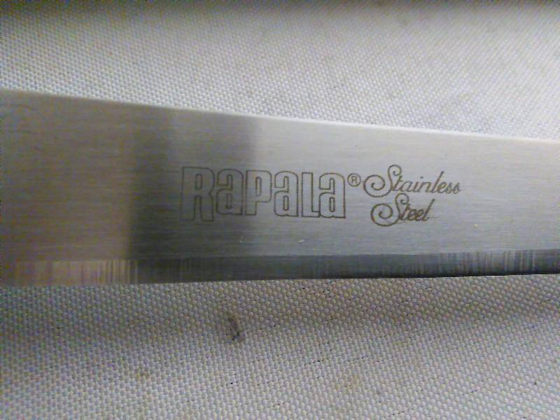 lot 404 image: Rapala Knife, 6 Blade, Poly Handle, Safety Protector Tip