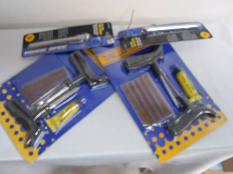 lot 458 image: Tubeless Tire Repair Kit (2) and Tire Pressure Gauges (2)