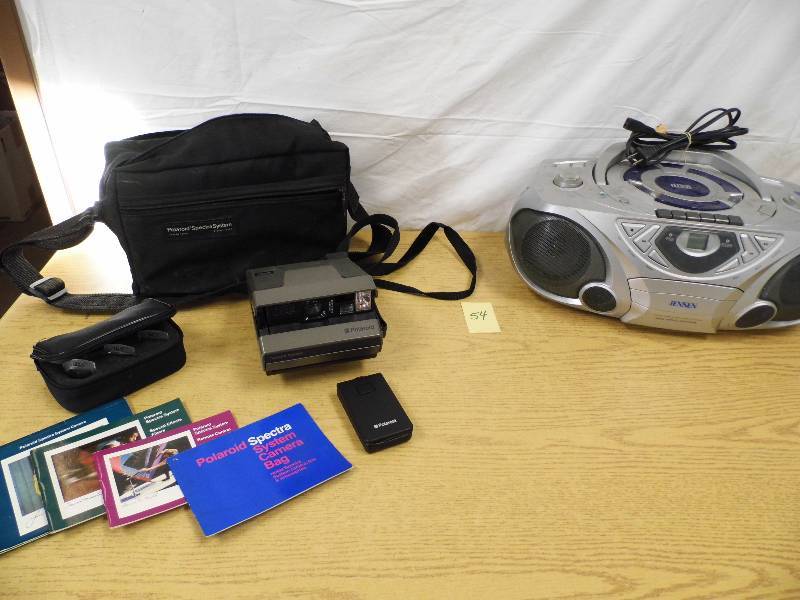 lot 54 image: Jensen Portable Stereo & Polaroid Spectra