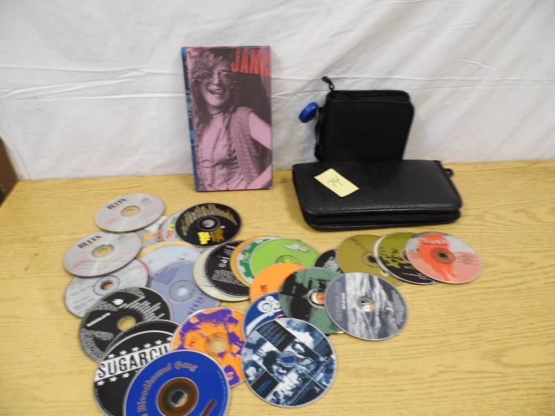 lot 74 image: Janis Joplin Boxed Set - Muisc CDs and Holders