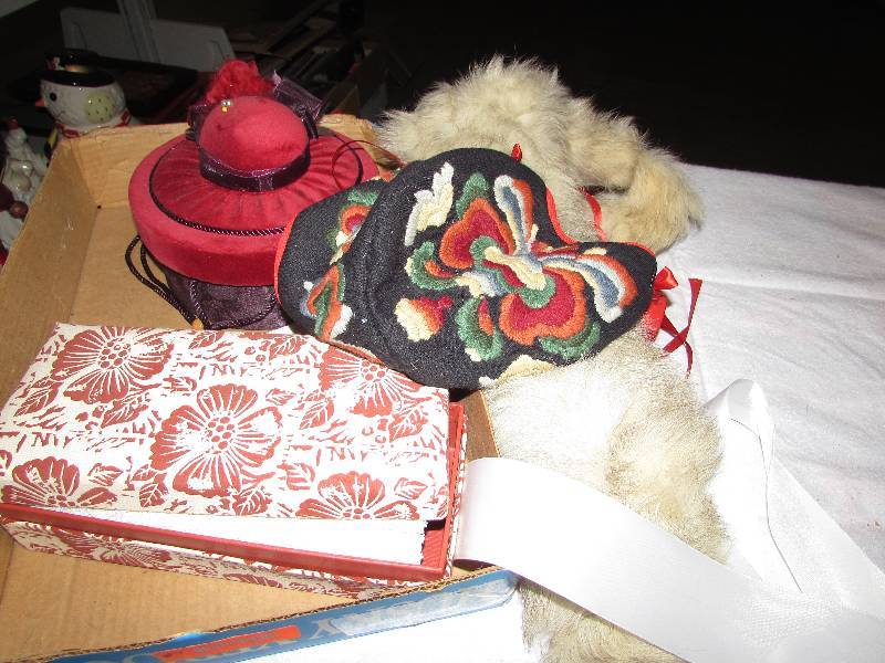 lot 87 image: Norwegian bonnet, fur sholder wrap, padded box with a hand bag, gloves and hankies, small hot shaped box with contents