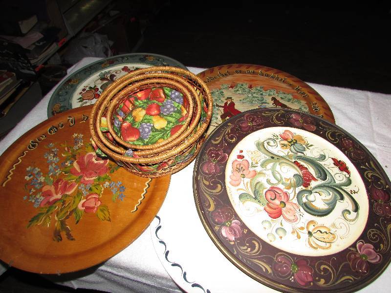 lot 110 image: Rosemal Painted wooden platters or wall hangings and three baskets