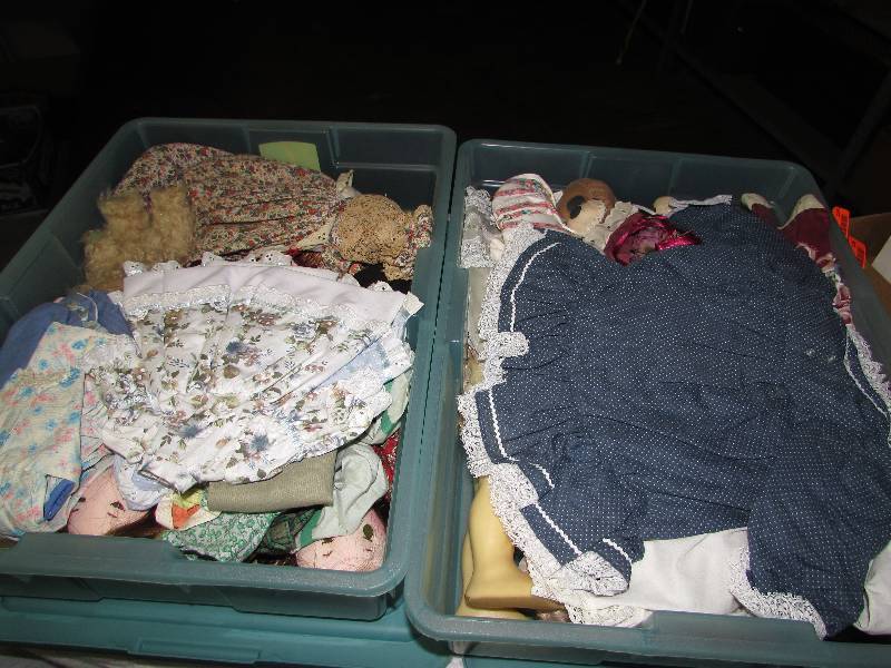 lot 119 image: Old dolls and doll clothes