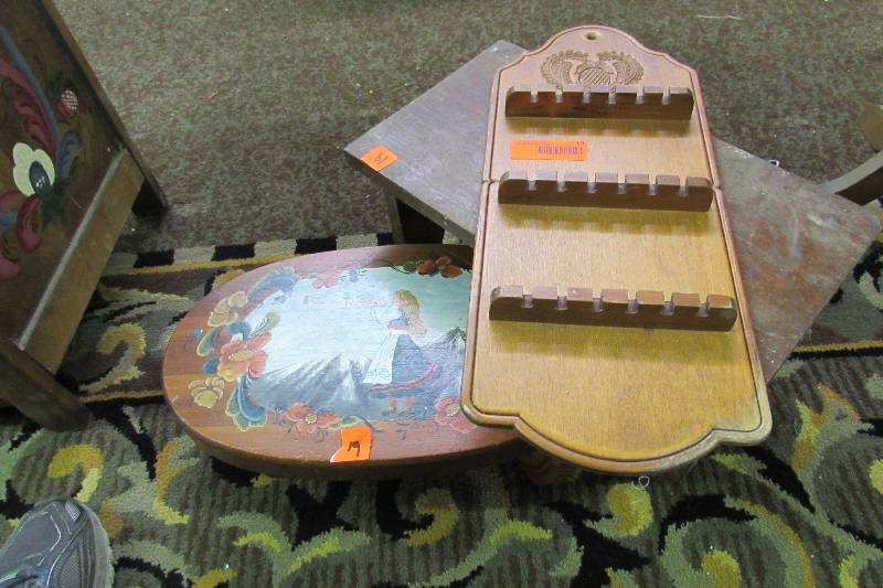 lot 19 image: Footstool with rosemal painting, one leg has been reglued but not at the right angle so it doesnt sit right, spoon shelf and plain foot stool