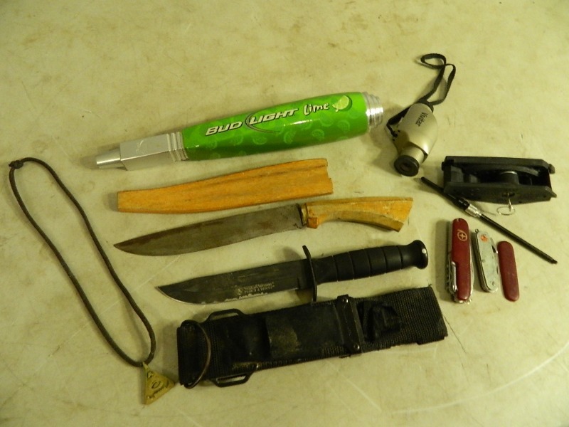 lot 49 image: Beer Tapper Handle, Knife, Gun Lock, and More