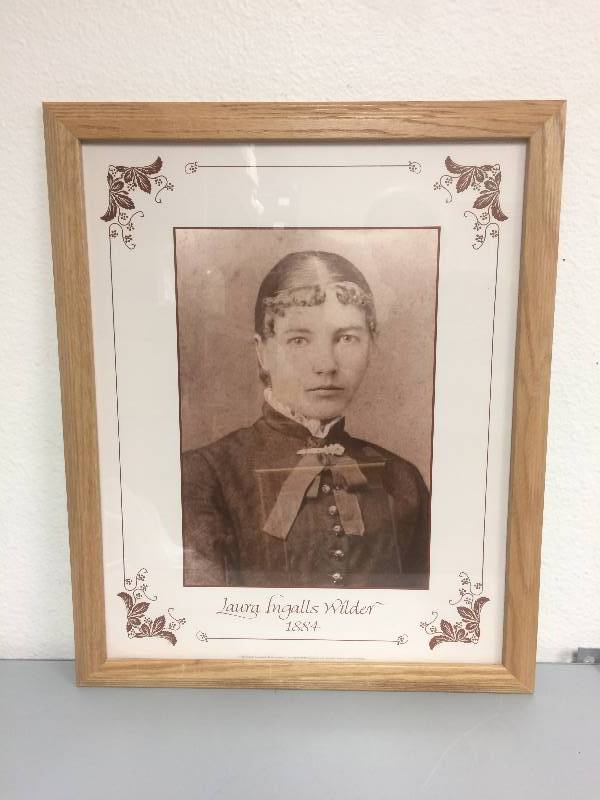 lot 22 image: Vintage Laura Ingalls Wilder Framed Print and Apron