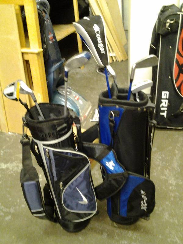 lot 22 image: Nike Youth Golf Bags & 3 Clubs-Driver, Iron, Putter, Cougar WC-3 Youth Golf Bag With 4 Clubs-Driver, 2 Irons, Putter