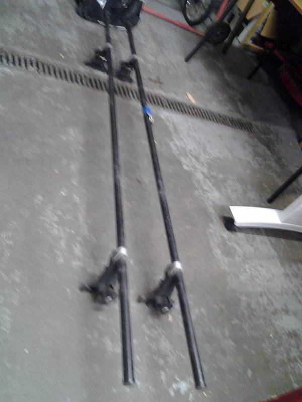 lot 51 image: Yakima Roof Rack (78-Inch BarsRain Gutter Towers, Includes 4-SKS Locks & Keys)