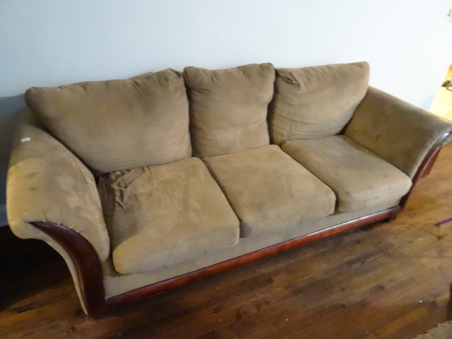 lot 7 image: Full size micro fiber couch. Wood frame.