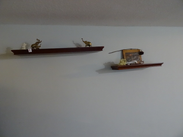 lot 8 image: 2 floating wall shelves. 36 and 24, Comes with dcor
