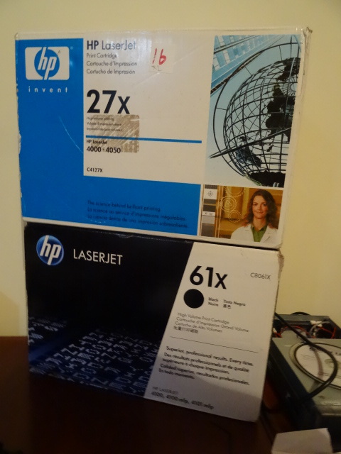 lot 16 image: HP laserjet 27X print cartridge. HP laser jet 61X print cartridge. Both new sealed in the box