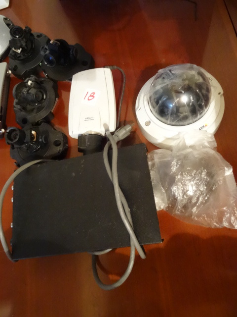 lot 18 image: 5 misc security cameras. Axis 216FD. Qty 3. Axis 211 network camera. Axis ceiling dome. Distribution amplifier. DA104DT