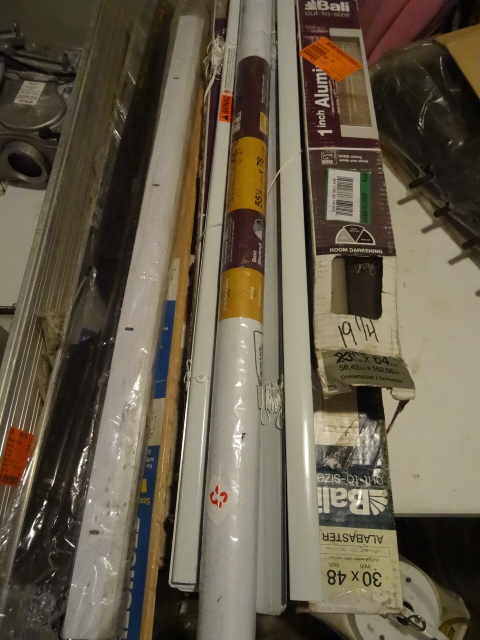 lot 53 image: Misc new door threshholds and window blinds.