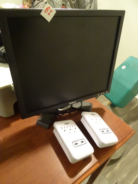 lot 82 image: Dell 17 computer monitor. Prime model PB802112 surge protector and USB charger. Qty 2.