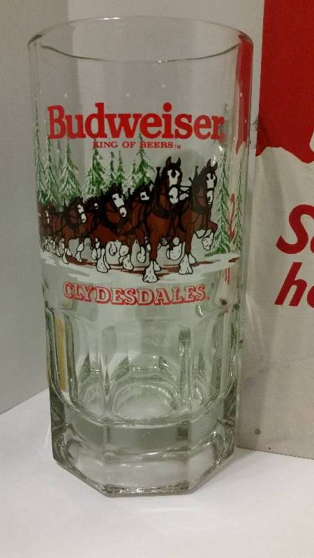 lot 119 image: Two (2) Budweiser Beer 32oz Collectable Glass Steins and a Budweiser Metal Vintage Sign.