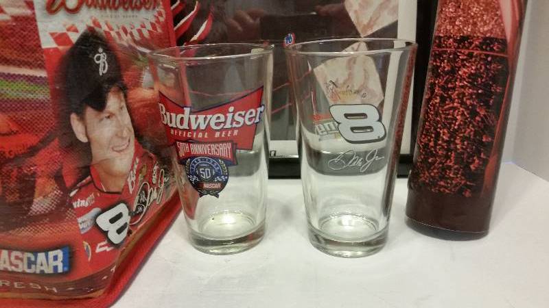 lot 231 image: Large Lot of #8  Dale Earnhardt Jr Memorabelia Items - Print, Summer Cooler, Large Poster, Dale Jr, Glass and 50th Anniversary NASCAR