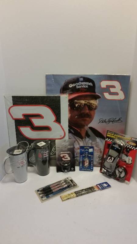 lot 228 image: Large Lot of #3 Dale Earnhardt Collectible Memorabelia - Thermal Mugs, Metal Sign, Poster, Keychain, RC Car, Pens and Pencils