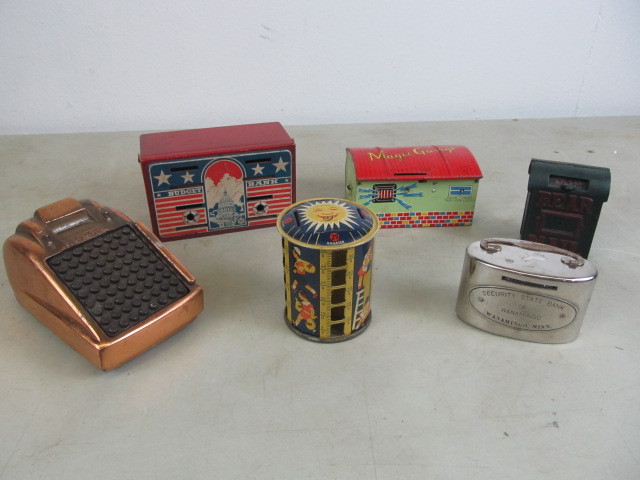 lot 55 image: Lot of Vintage Banks & Tin Magic Garage Toy