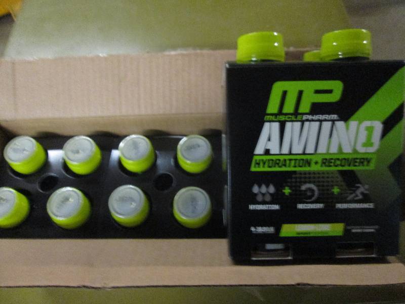 lot 233 image: 1 case of 12 16.9floz bottles of M...