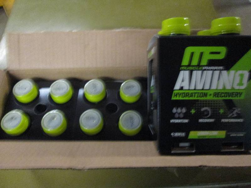 lot 239 image: 1 case of 12 16.9floz bottles of M...