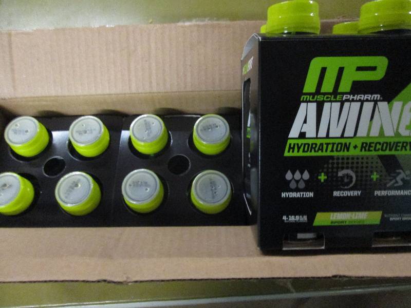 lot 241 image: 1 case of 12 16.9floz bottles of M...