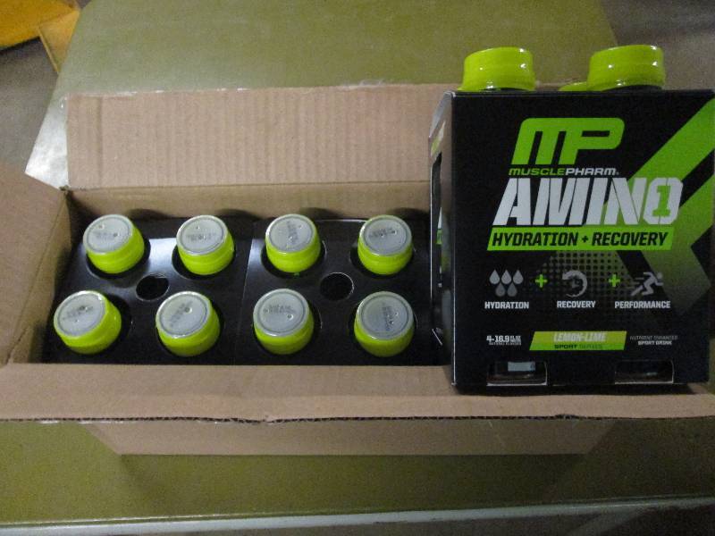lot 243 image: 1 case of 12 16.9floz bottles of M...