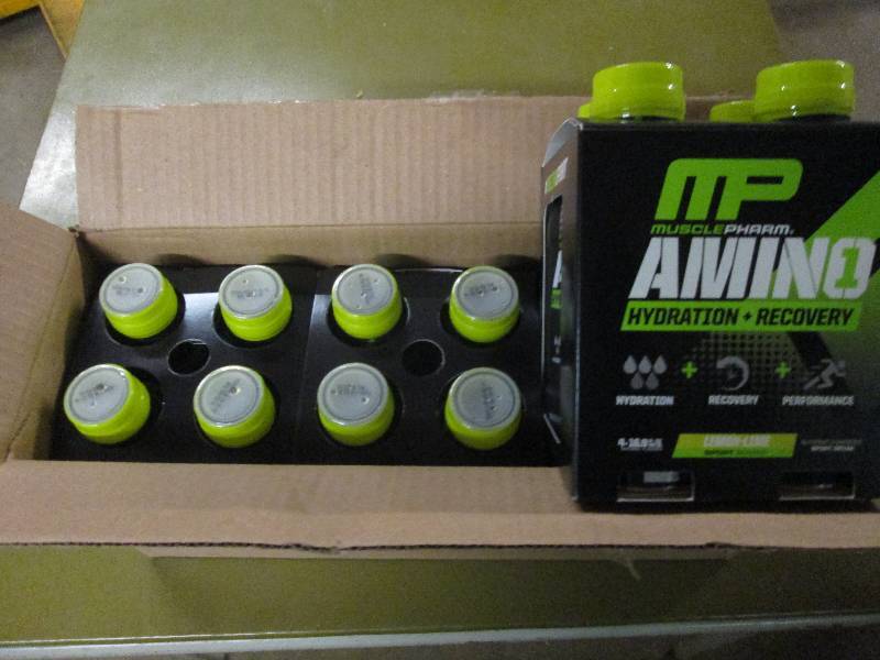 lot 244 image: 1 case of 12 16.9floz bottles of M...