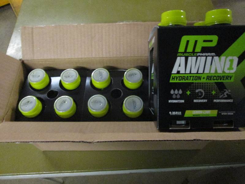 lot 245 image: 1 case of 12 16.9floz bottles of M...