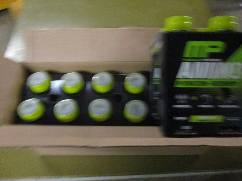 lot 246 image: 1 case of 12 16.9floz bottles of M...