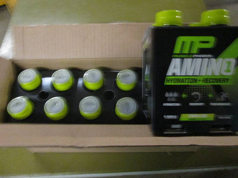 lot 247 image: 1 case of 12 16.9floz bottles of M...