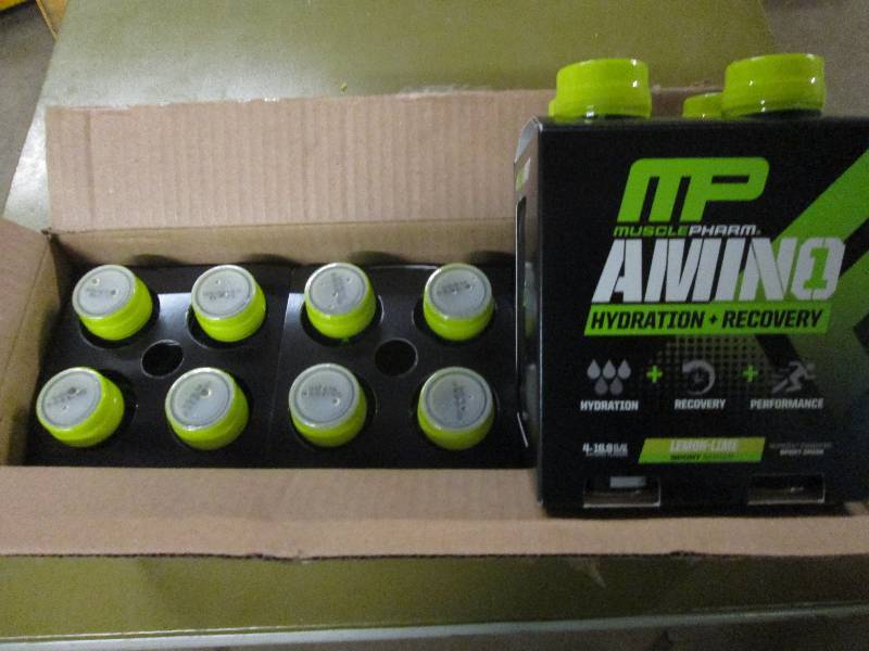 lot 253 image: 1 case of 12 16.9floz bottles of M...