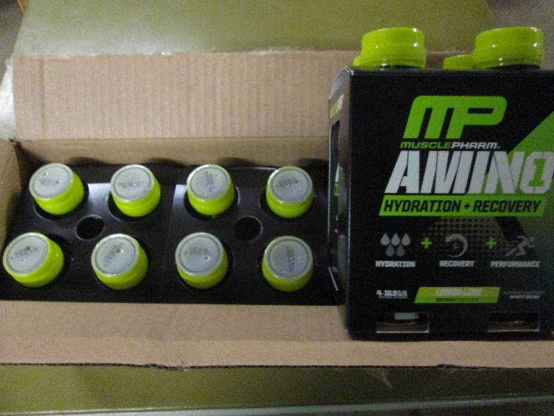 lot 255 image: 1 case of 12 16.9floz bottles of M...