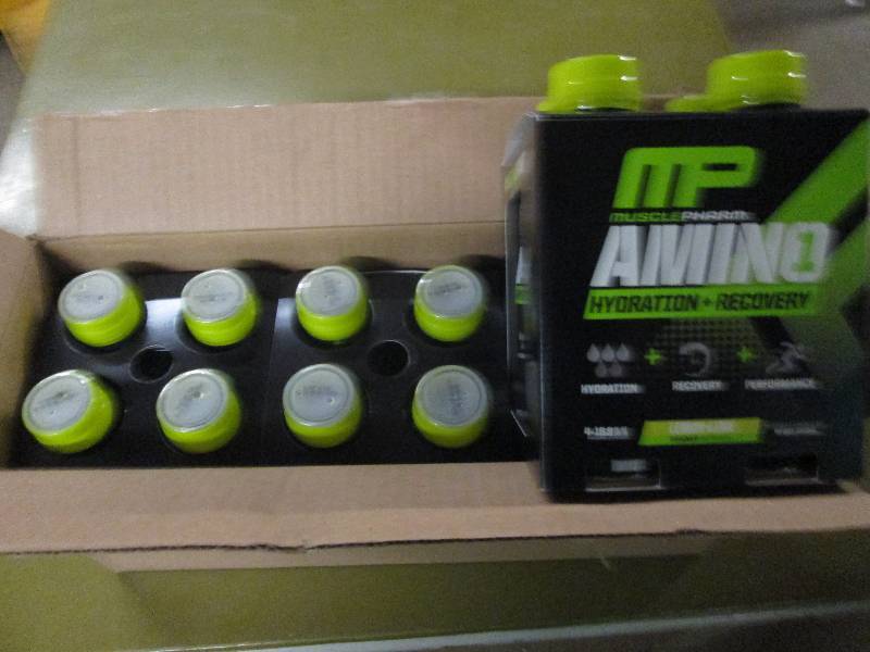 lot 257 image: 1 case of 12 16.9floz bottles of M...
