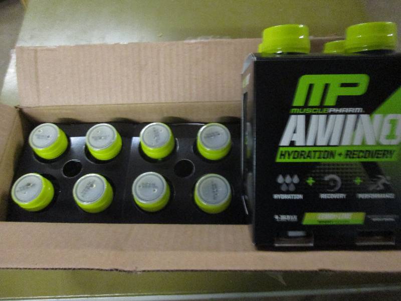 lot 259 image: 1 case of 12 16.9floz bottles of M...