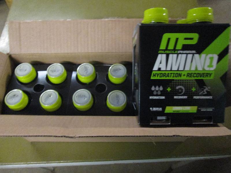 lot 275 image: 1 case of 12 16.9floz bottles of M...