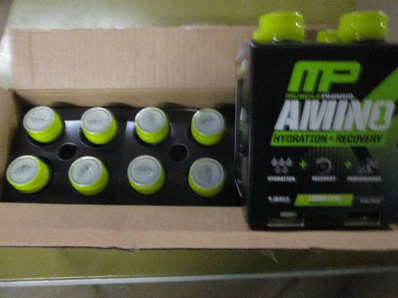 lot 276 image: 1 case of 12 16.9floz bottles of M...