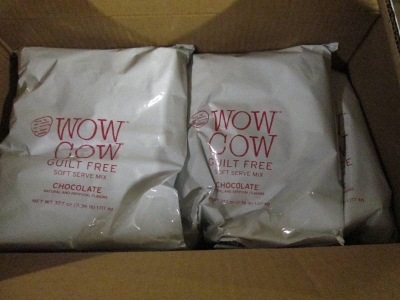 lot 288 image: 1 case of 82.36lb bags of wow cow ...