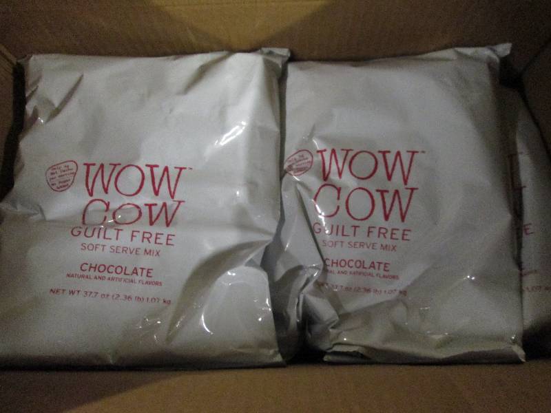 lot 289 image: 1 case of 82.36lb bags of wow cow ...