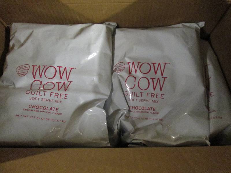 lot 290 image: 1 case of 82.36lb bags of wow cow ...