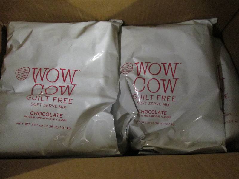 lot 291 image: 1 case of 82.36lb bags of wow cow ...