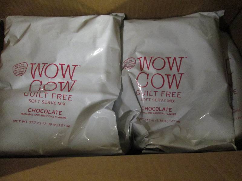 lot 292 image: 1 case of 82.36lb bags of wow cow ...