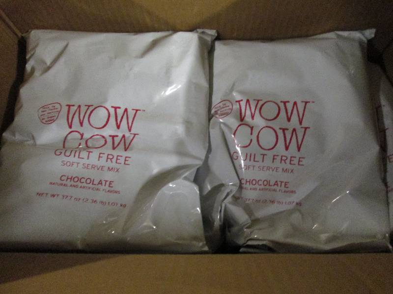 lot 293 image: 1 case of 82.36lb bags of wow cow ...