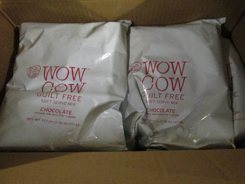 lot 294 image: 1 case of 82.36lb bags of wow cow ...