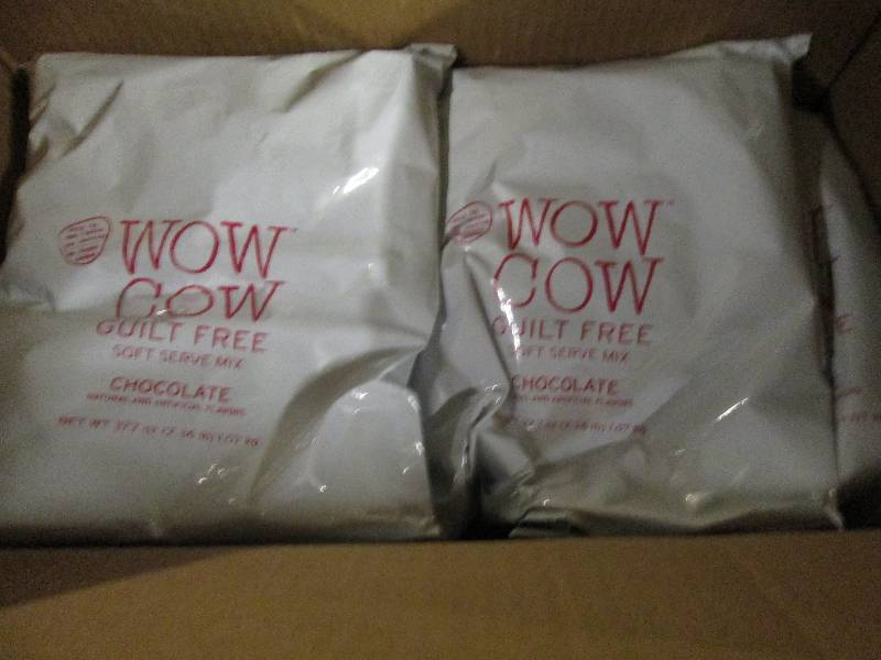 lot 295 image: 1 case of 82.36lb bags of wow cow ...
