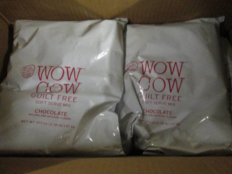 lot 296 image: 1 case of 82.36lb bags of wow cow ...