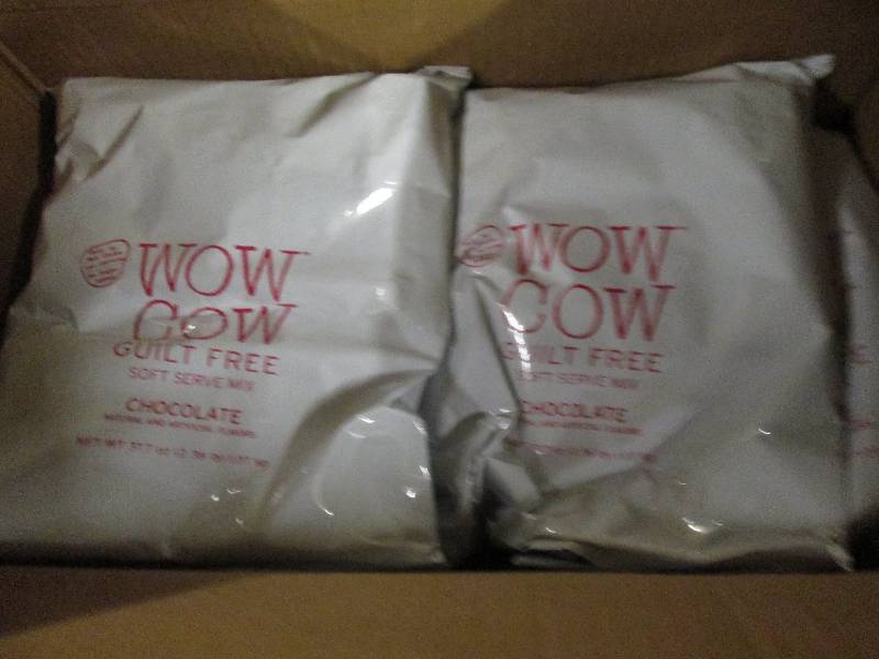 lot 298 image: 1 case of 82.36lb bags of wow cow ...